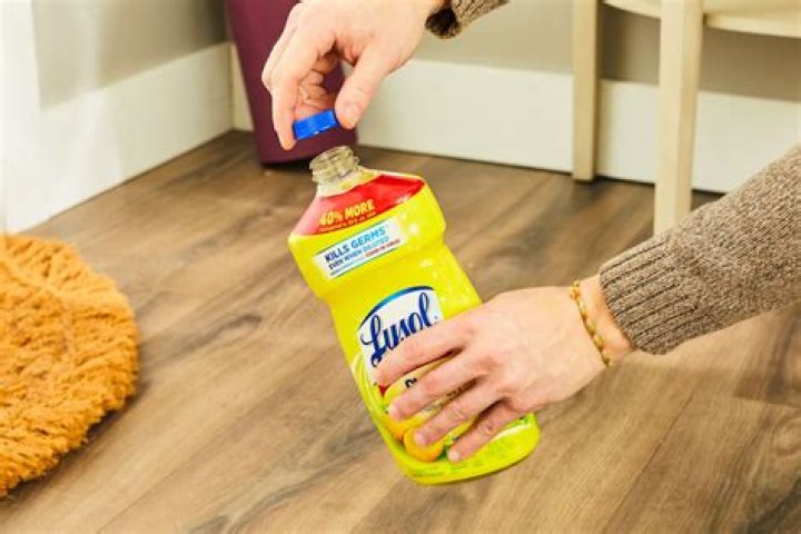 Can I use Lysol wipes on hardwood floors?