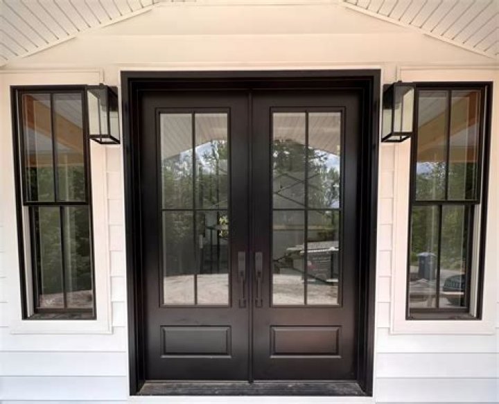 Why did old farm houses have two front doors?